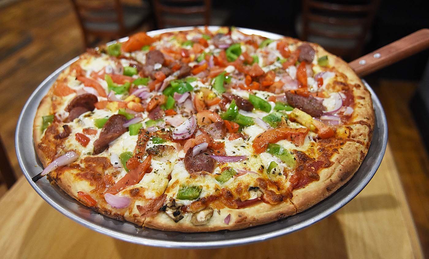 Taso's now serving homemade pizza and authentic Greek food in